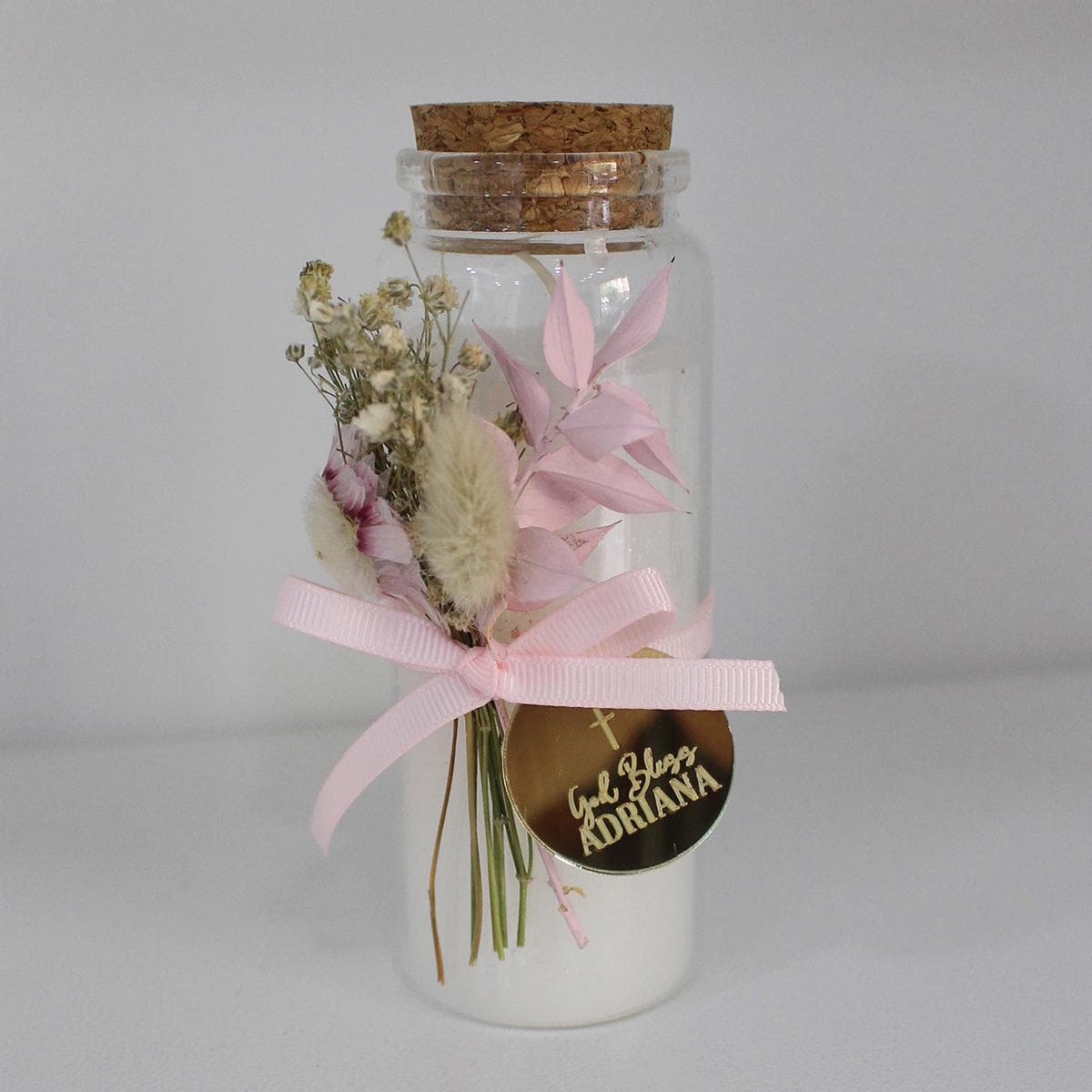 Glass tube with candle inside