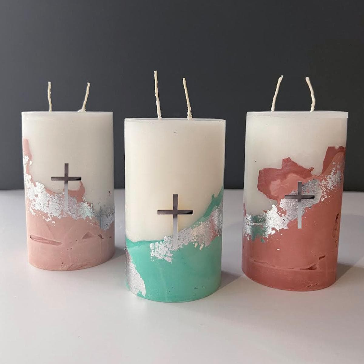 Half concrete. half candle souvenir, with a gold or silver acrylic cross