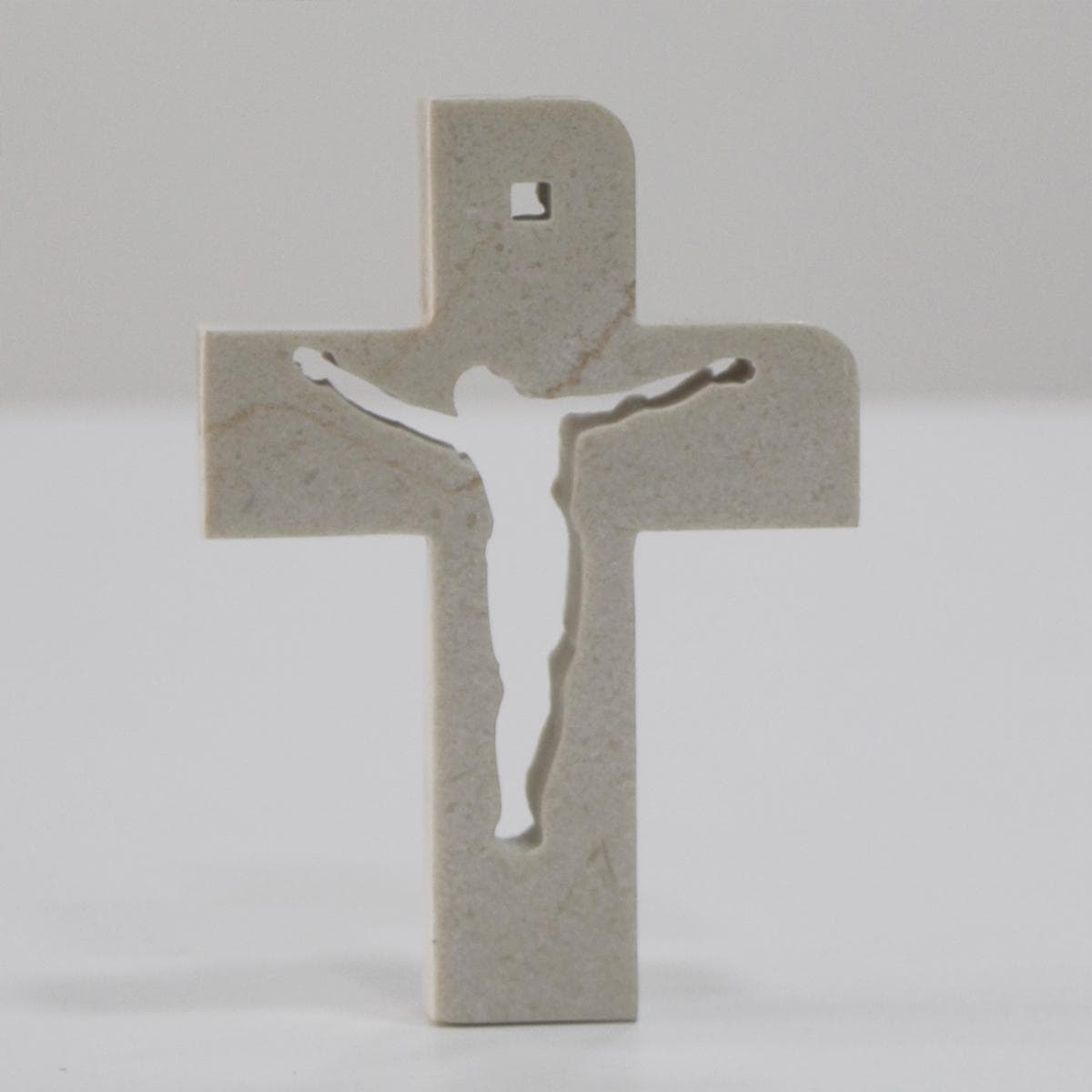 Marble cross with a die cut of Christ